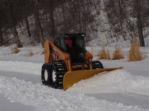 track skid steer in swamp|Best Skid Steer Tracks and Snow Chains for Winter .